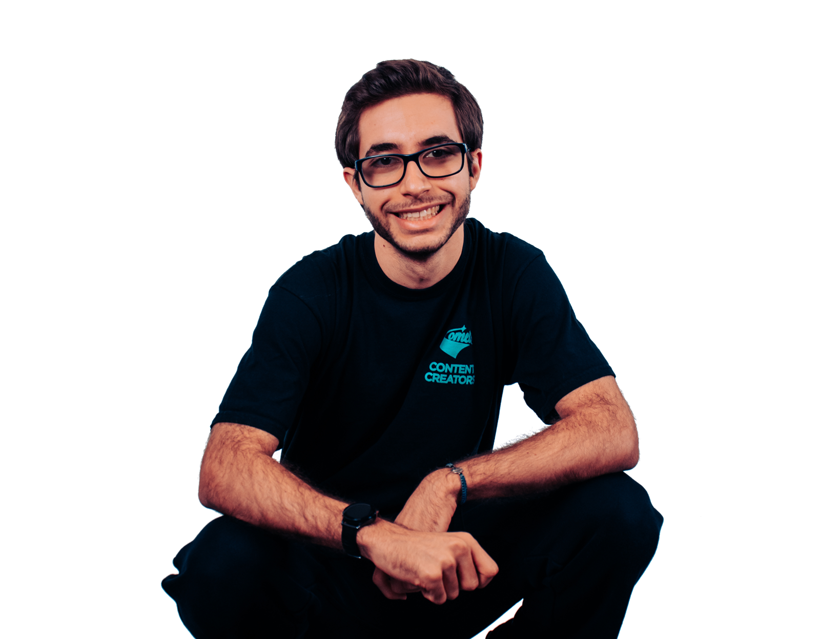 Luca Scutari, smiling, arms crossed on his knee